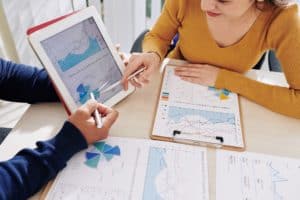 Managers working with financial chart