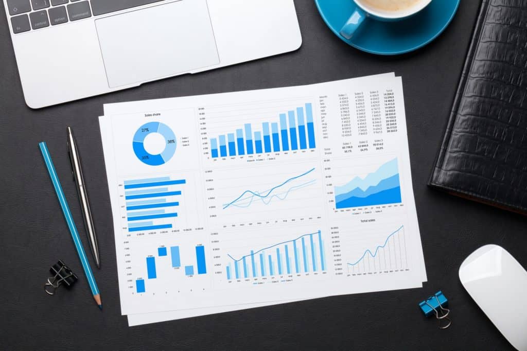 Office workplace table with reports